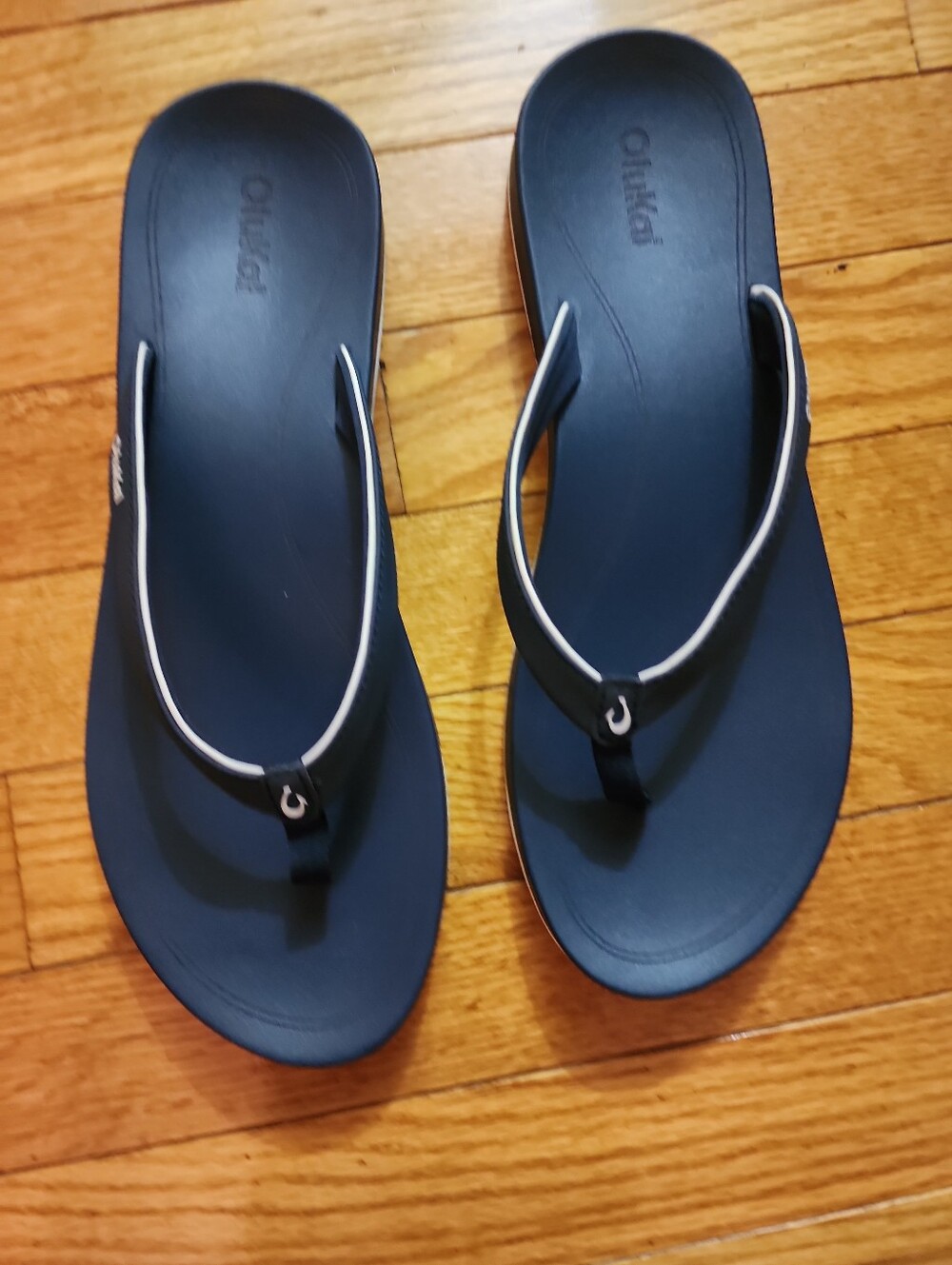 OluKai  UIKI Everyday Beach Navy Flip Thong Sandals with White Piping